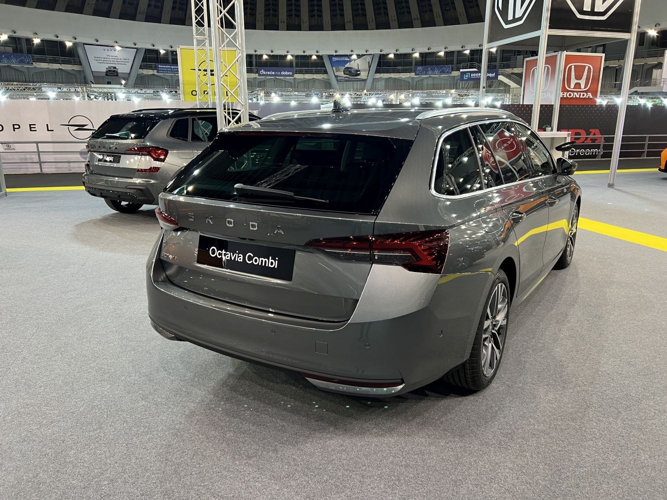 Rear and side view of a modern station wagon with sleek tail lights and tinted windows.