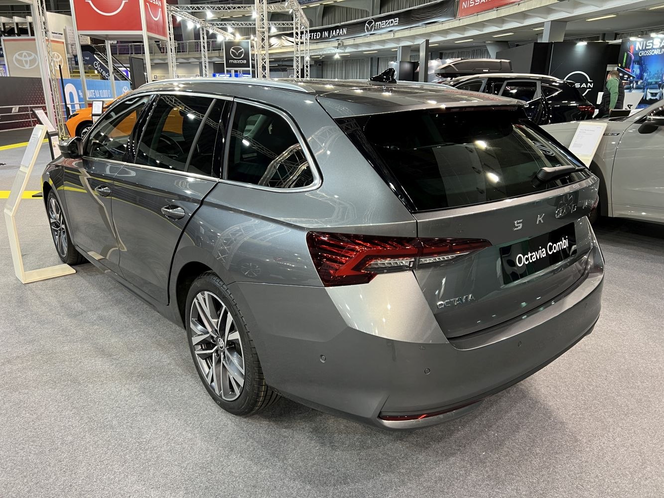 Rear and side view of a modern estate car with sleek tail lights