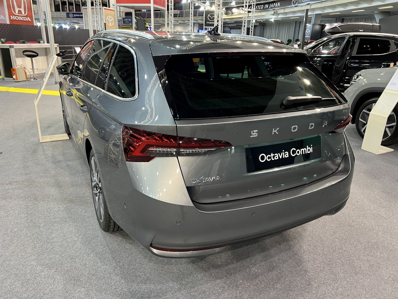 Rear view and LED tail lights of a 2024 estate car with spacious design