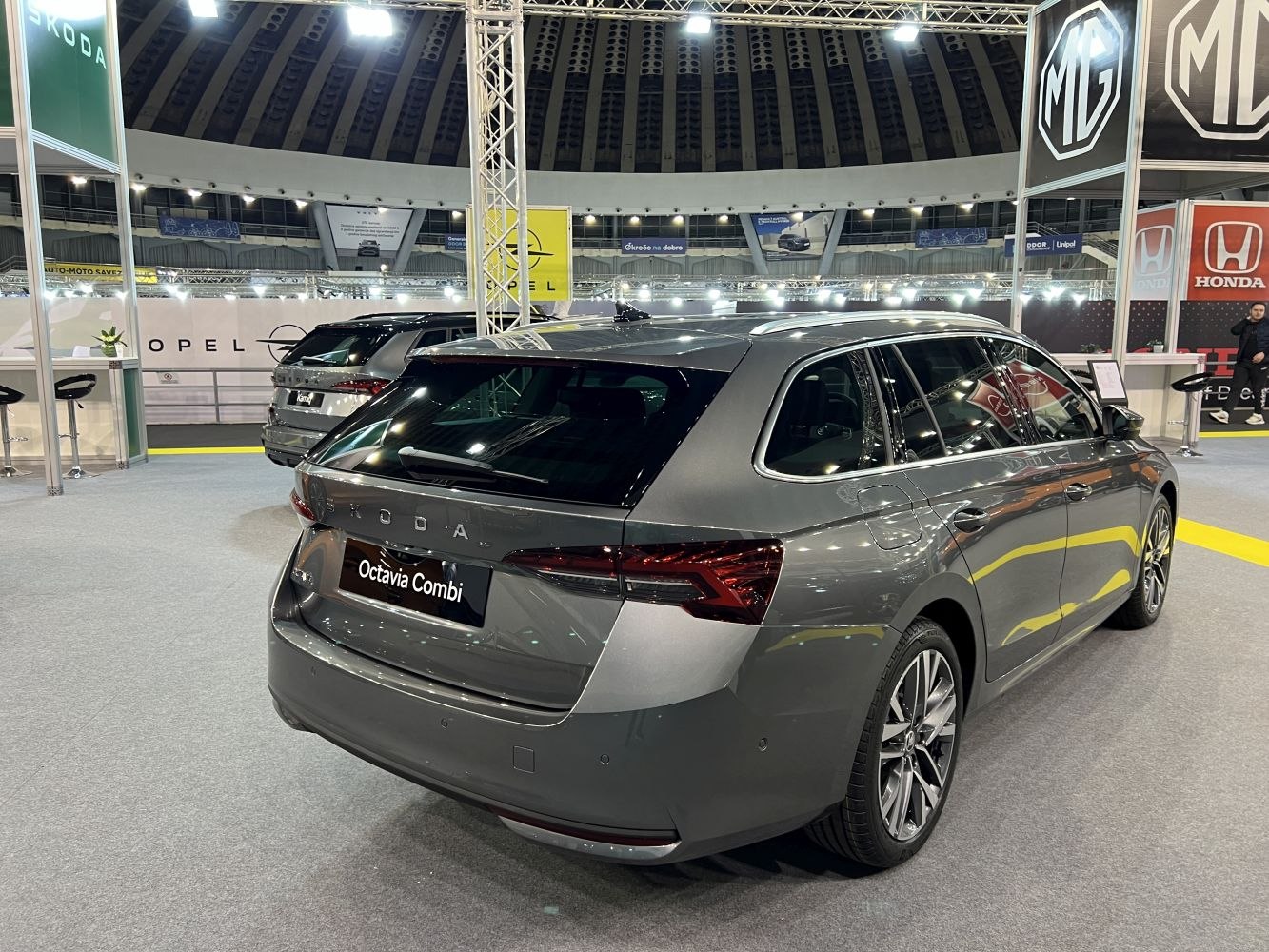 Rear and side profile of a modern station wagon with sleek tail lights and alloy wheels