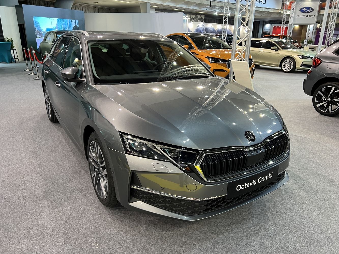 Front view with sharp headlights and prominent grille