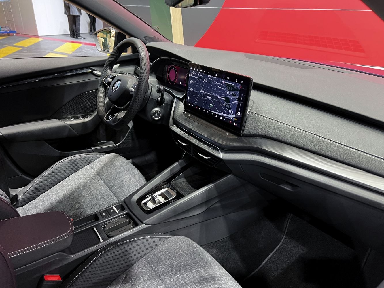 Digital instrument cluster and floating infotainment screen in modern car interior