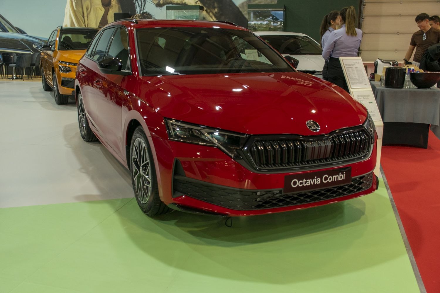 Front view of a modern wagon with a sharp grille and LED headlights