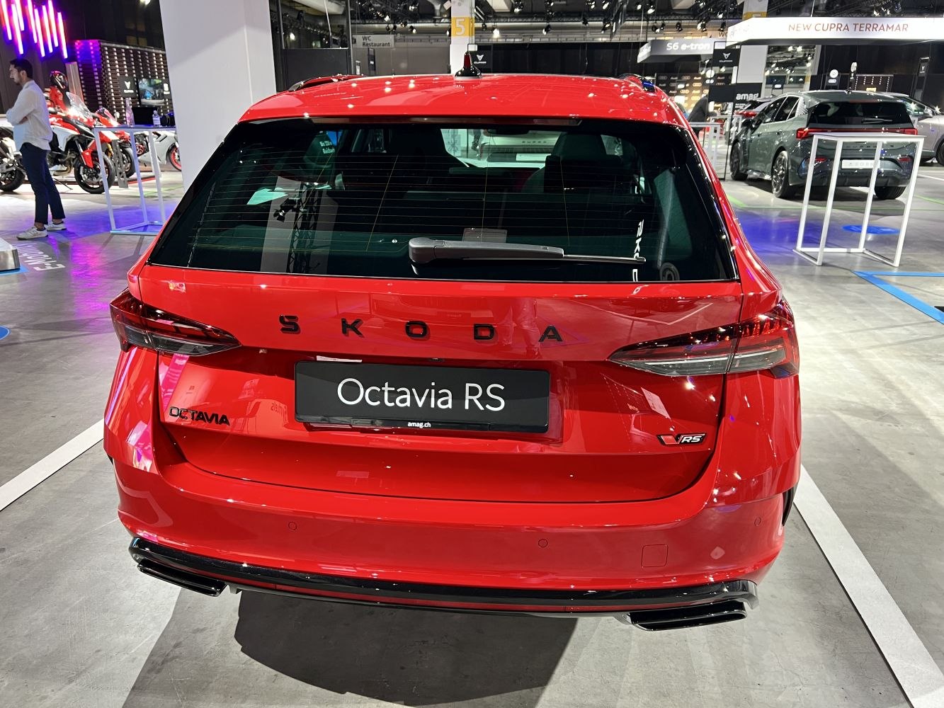 Rear view with sporty taillights and dual exhausts