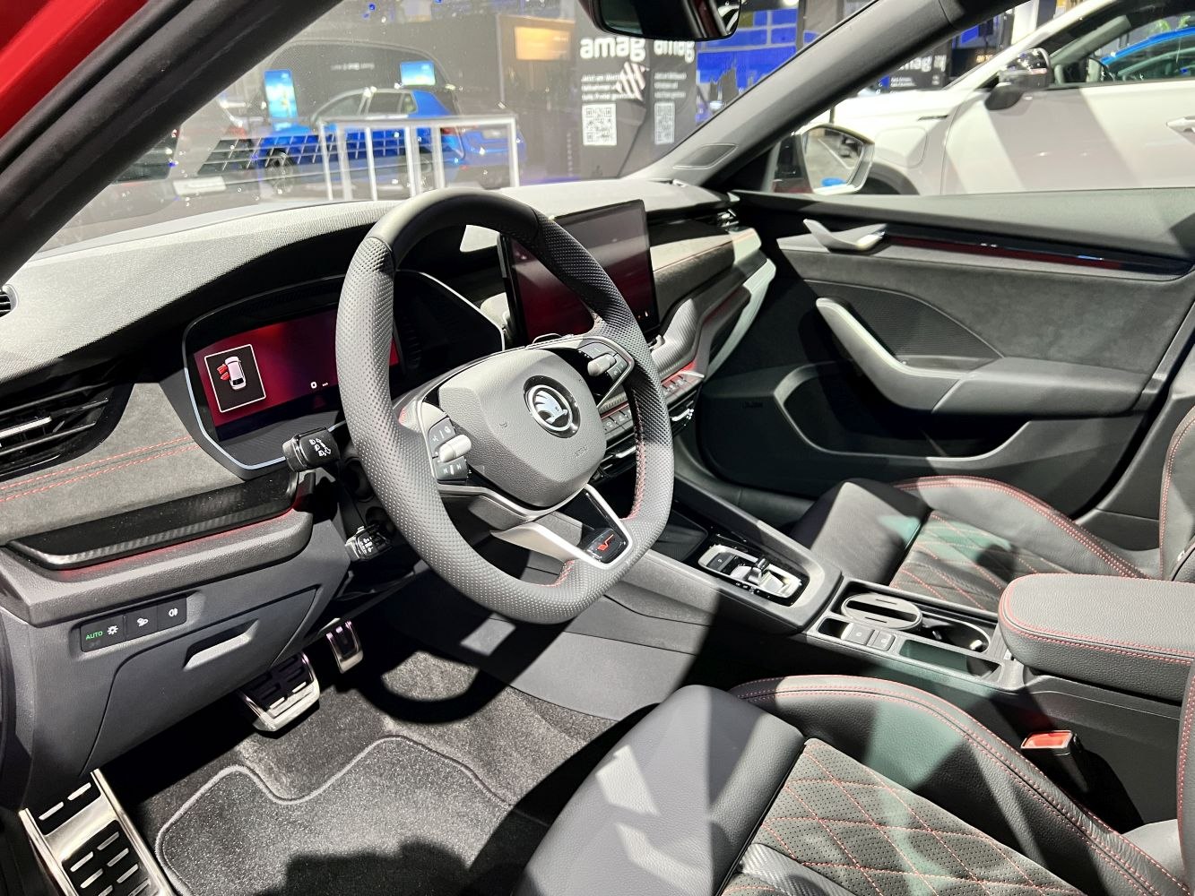 Modern car interior with digital cockpit and touchscreen