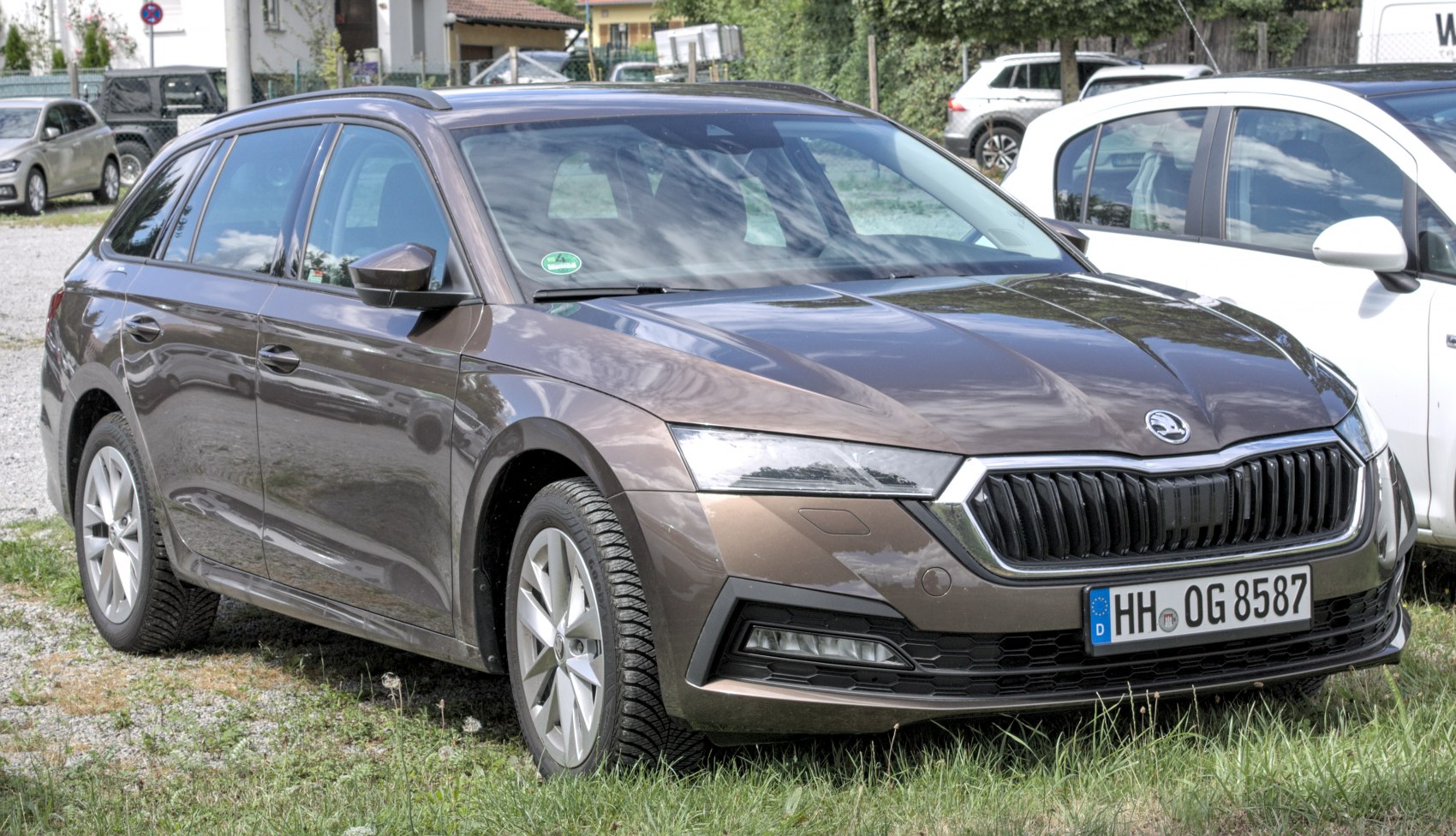 Front view of a sleek modern station wagon with distinct grille and headlights