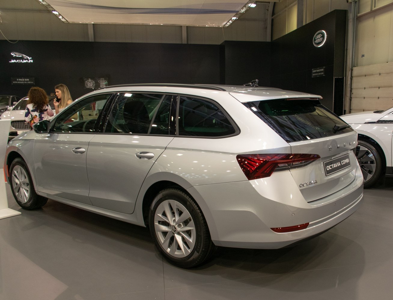 Silver station wagon with rear LED taillights and roof rails