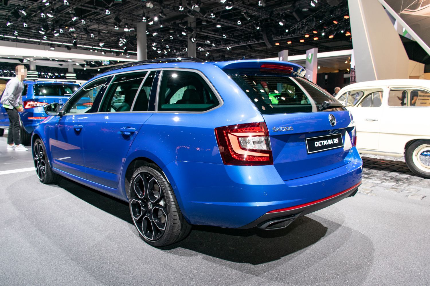 Blue sports wagon with black alloy wheels and LED tail lights