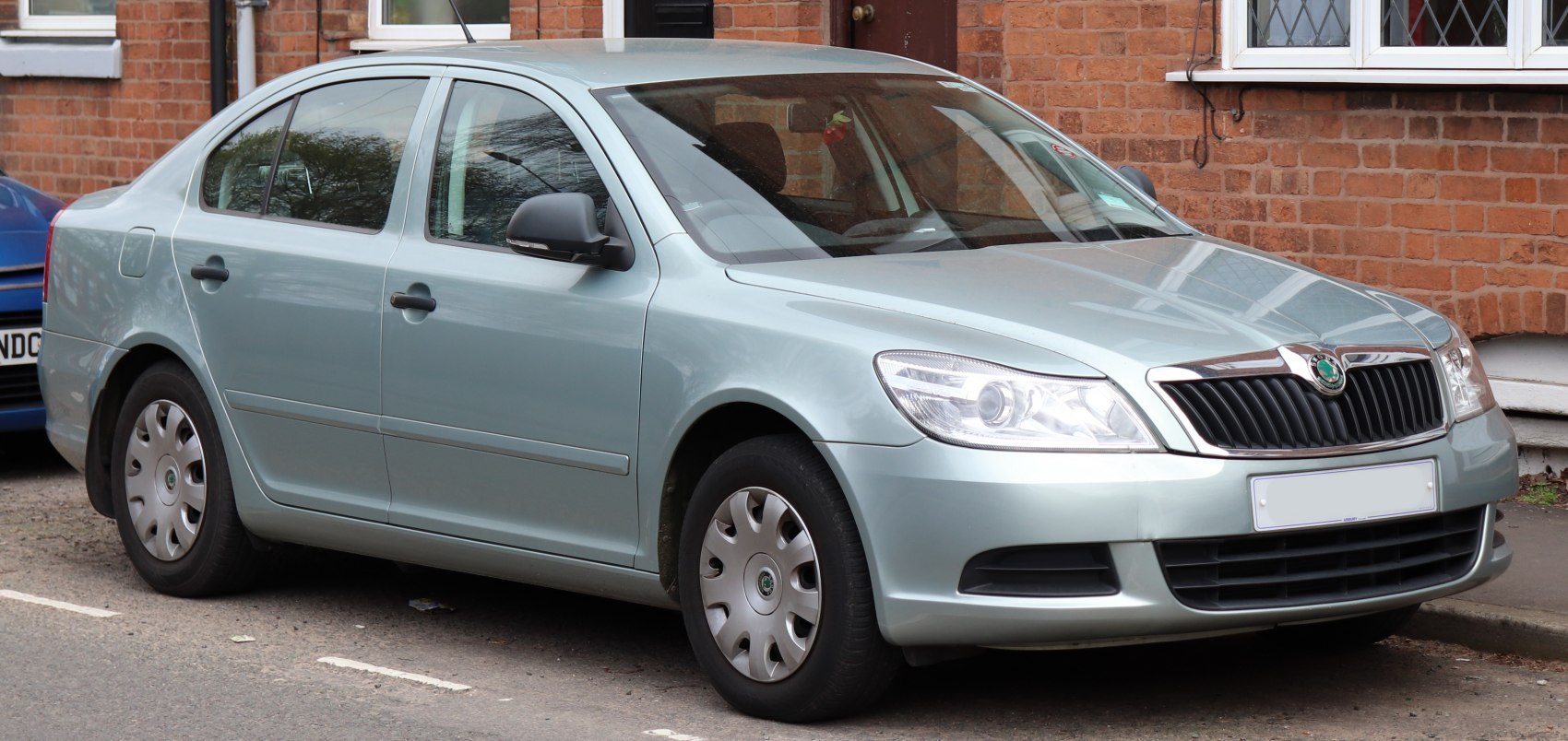 2009 sedan showing front grille and headlights