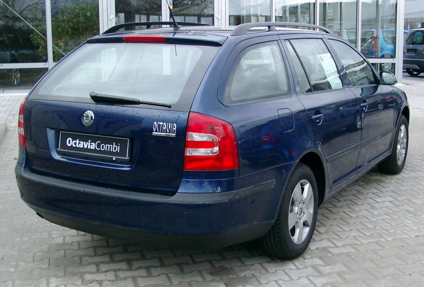 Rear view of station wagon with tail lights and hatchback rear door