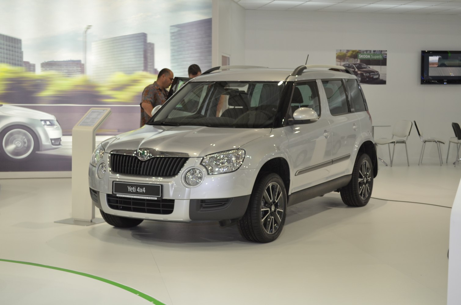 Front and side view of Skoda Yeti 4x4 SUV with distinctive grille and fog lights