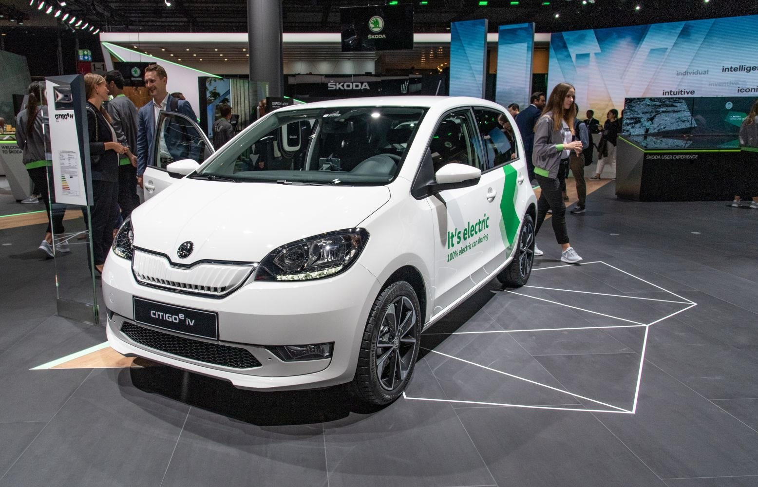 Electric 5-door city car with modern design front and side view