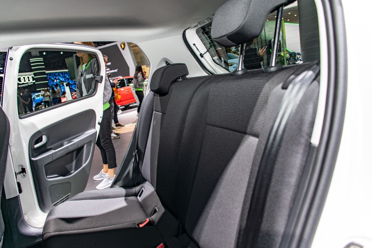 Rear fabric seats and open rear door of a compact 5-door hatchback