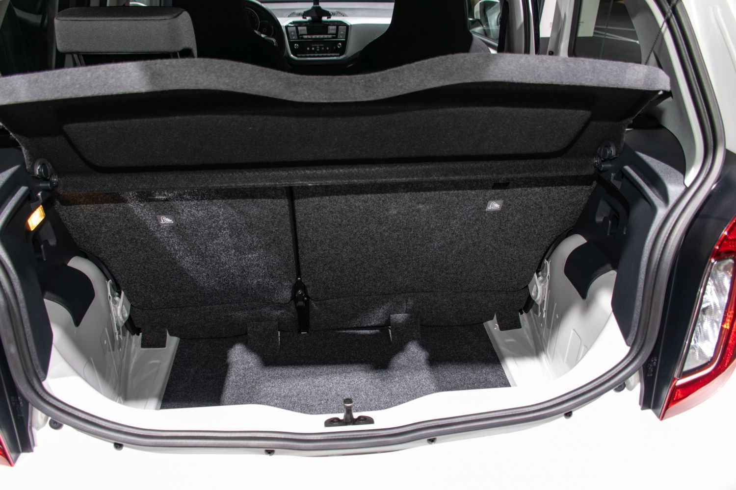 Rear trunk space with folded rear seats and interior view