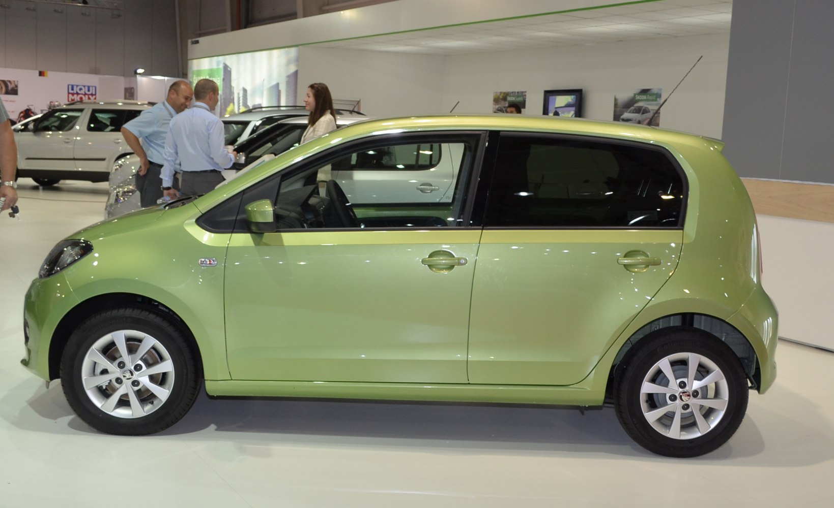 Side profile of 5-door compact hatchback with alloy wheels