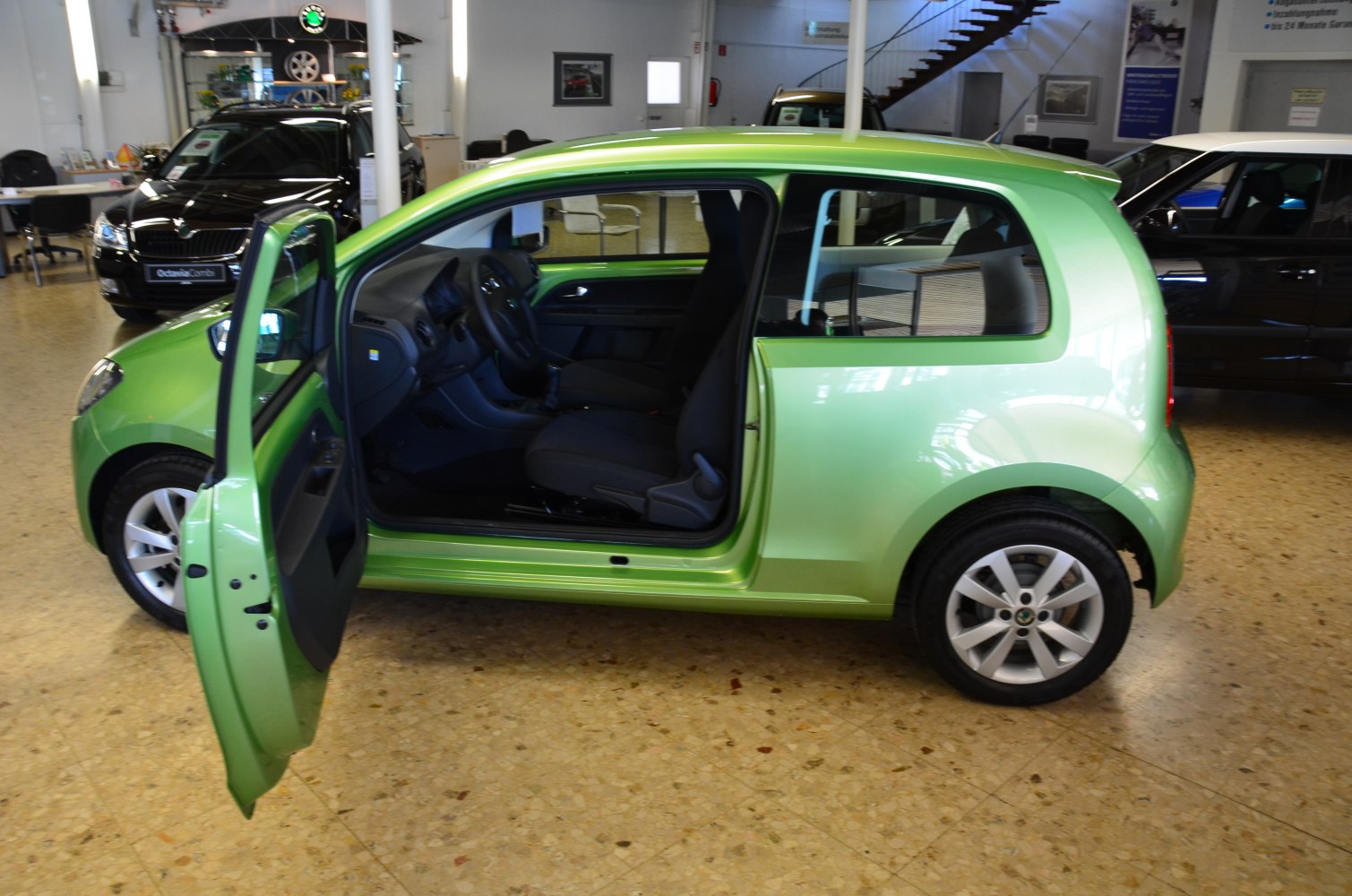 Compact 3-door hatchback with open front door