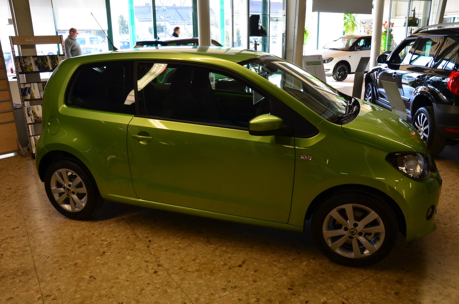 Green 3-door compact hatchback with alloy wheels
