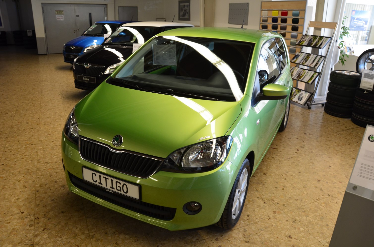 Compact 3-door hatchback front with grille and headlight details