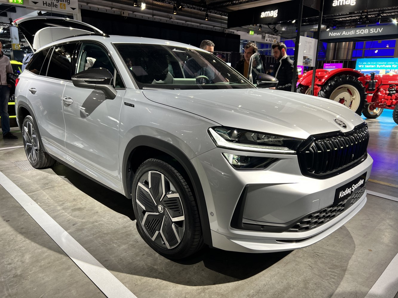 Front-side view with LED headlights and alloy wheels