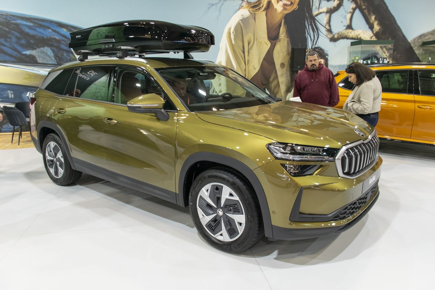 SUV with roof cargo box and LED headlights