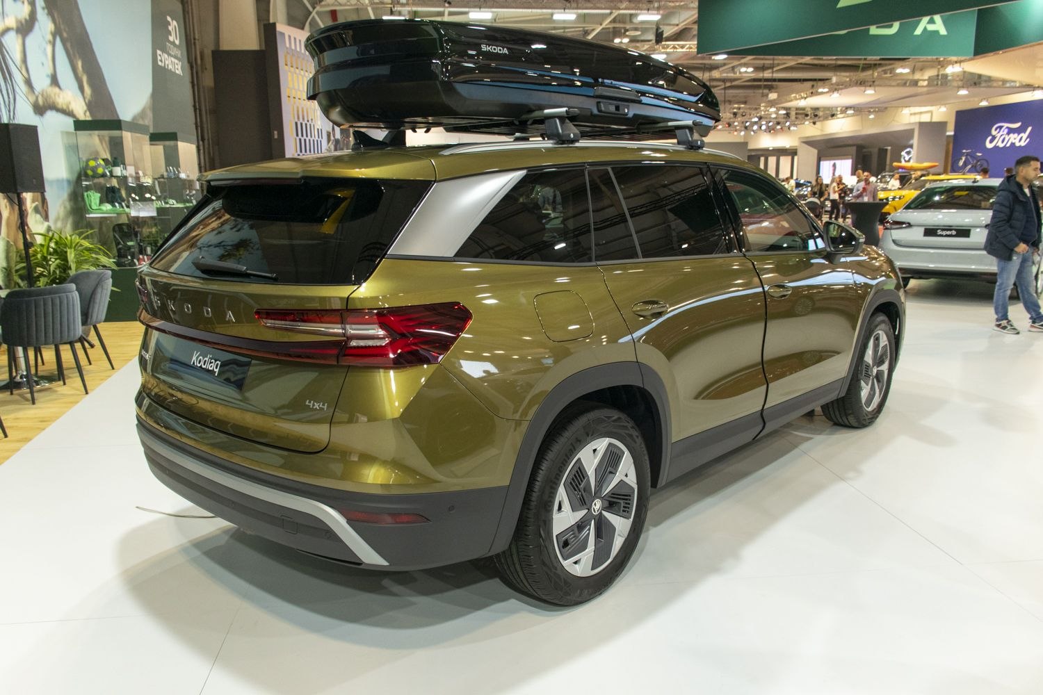 Rear view of SUV with roof box and modern taillights