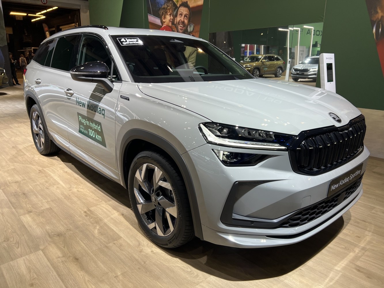 Front perspective of plug-in hybrid SUV with LED headlights and distinctive grille