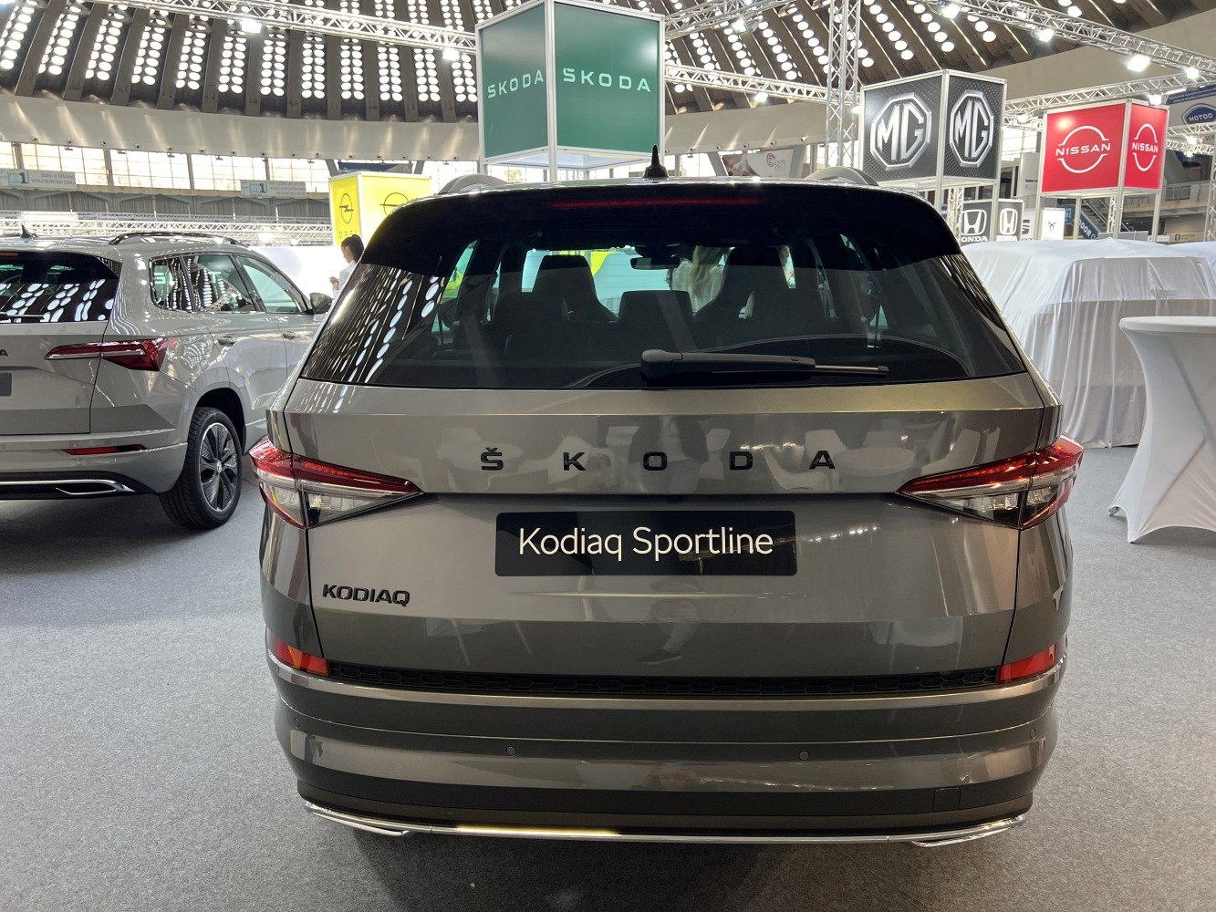Rear view of 2021 SUV with sleek taillights and ŠKODA lettering