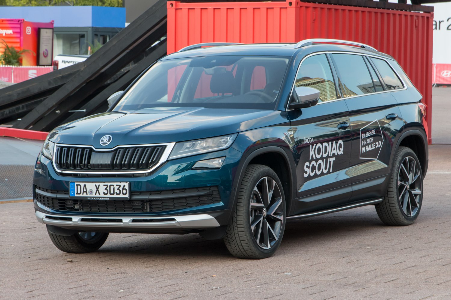 Front view of SUV with alloy wheels and modern grille design