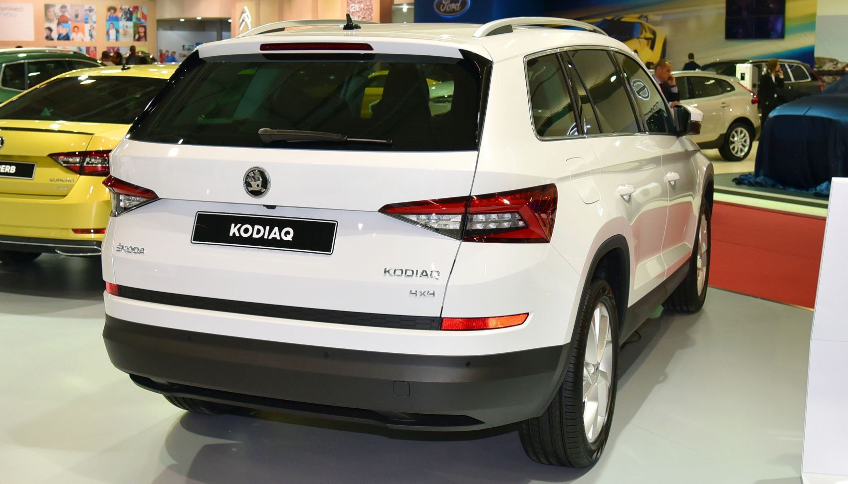Rear view of white SUV with 4x4 badge and distinct taillights