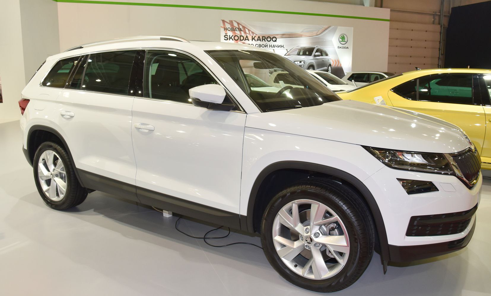 White modern SUV with alloy wheels and roof rails