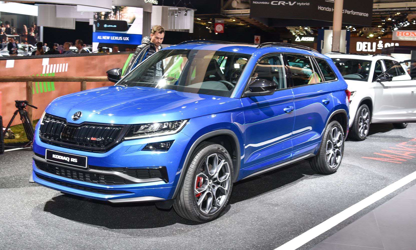 Blue SUV with sporty alloy wheels and distinctive front grille