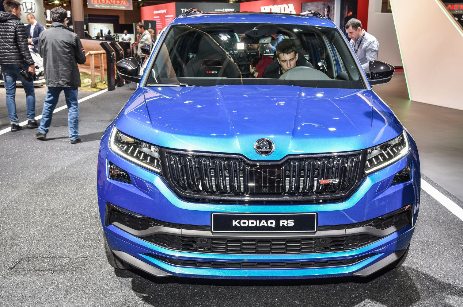 Front view with LED headlights and black sporty grille