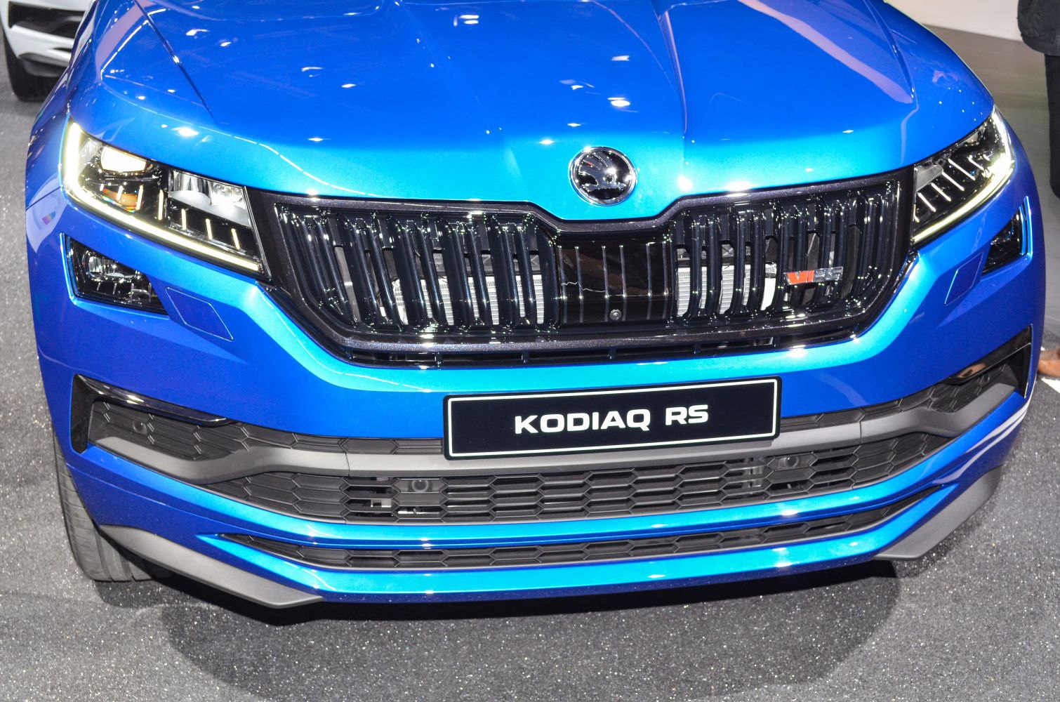 Close-up of front grille with RS badge and LED headlights