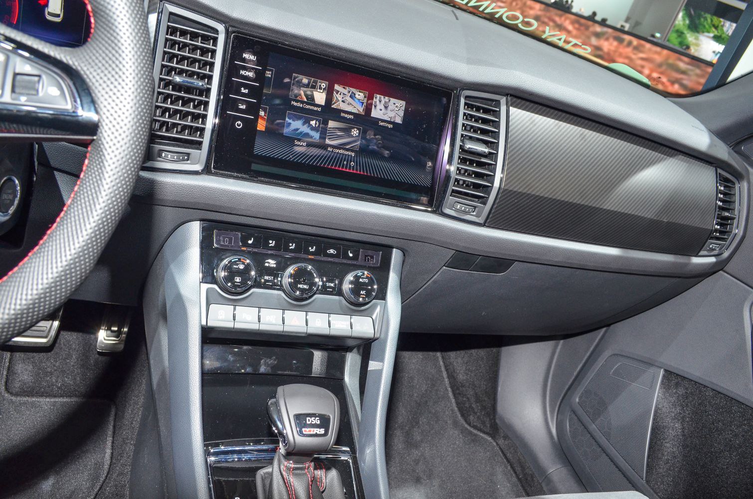 Touchscreen infotainment and DSG gear shift in car interior