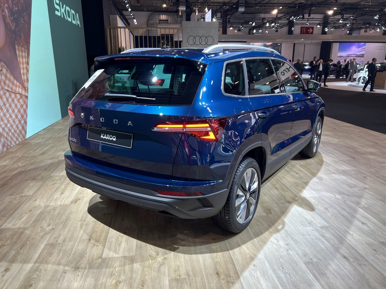 Rear view of modern SUV with LED taillights and roof rails