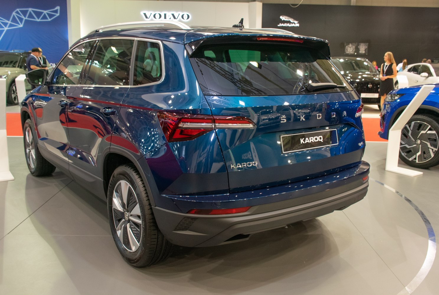 Rear view of a compact SUV with modern taillights and blue metallic paint