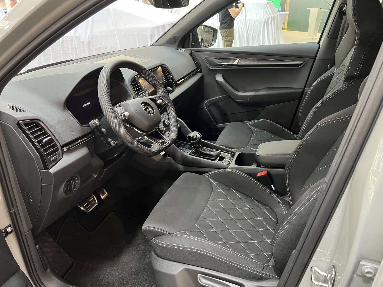 Modern car interior with sports seats and digital dashboard