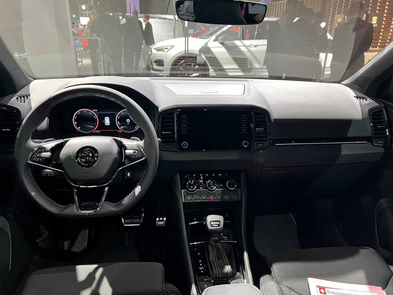 Interior dashboard with digital instrument cluster and multifunction steering wheel