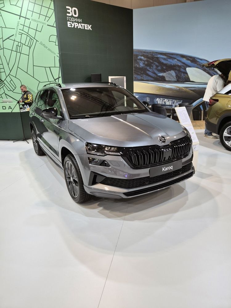 Front view of modern SUV with black grille and LED headlights