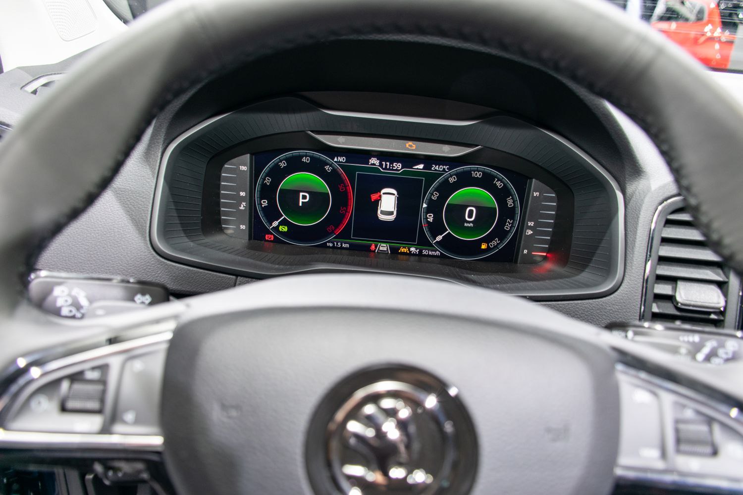 Digital instrument cluster with speedometer and gear indicator.