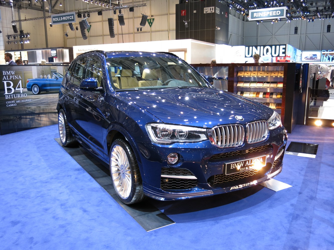 Luxurious SUV with a kidney grille and multi-spoke alloy wheels