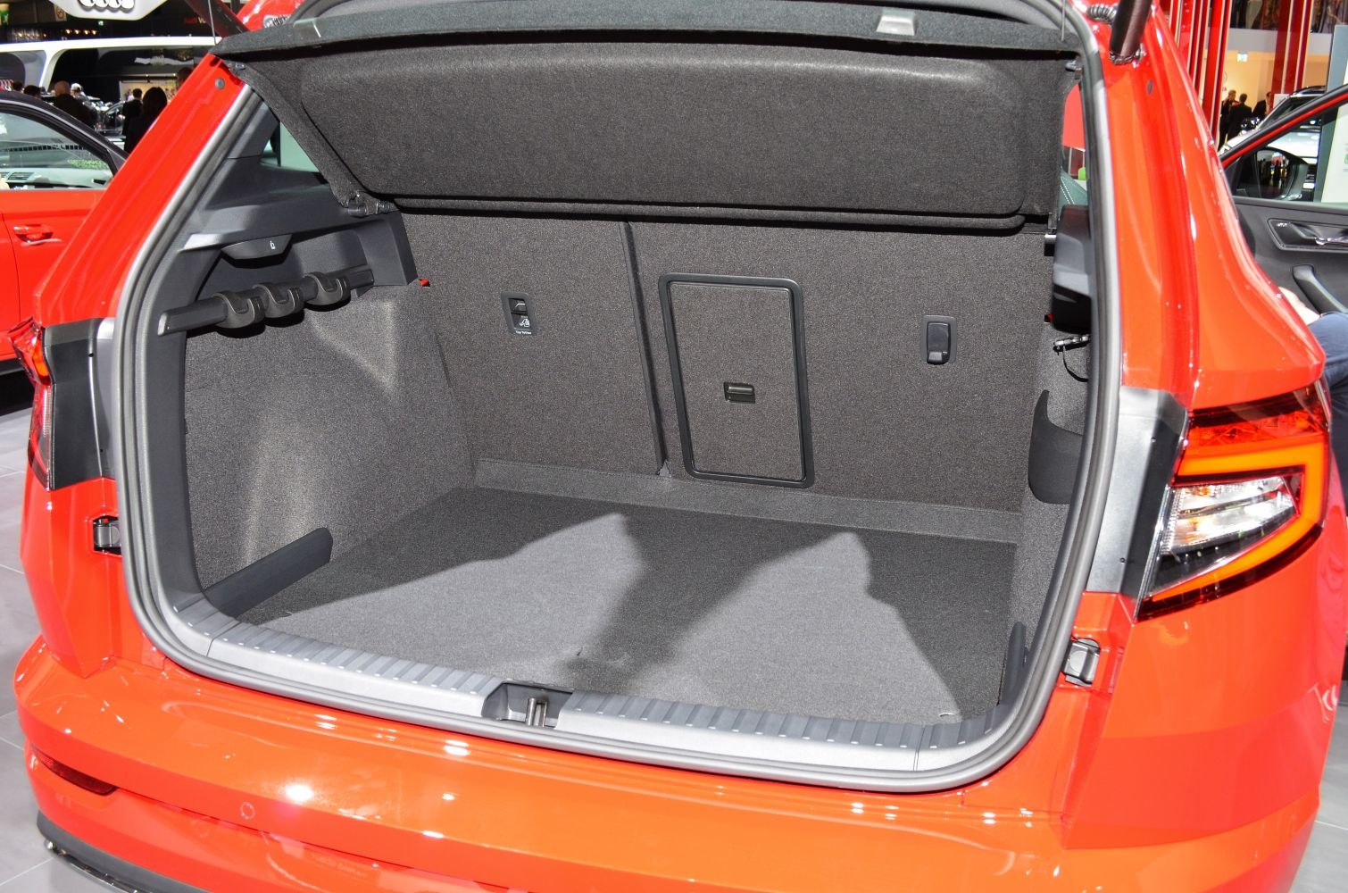 Spacious SUV trunk with foldable seats and storage hooks