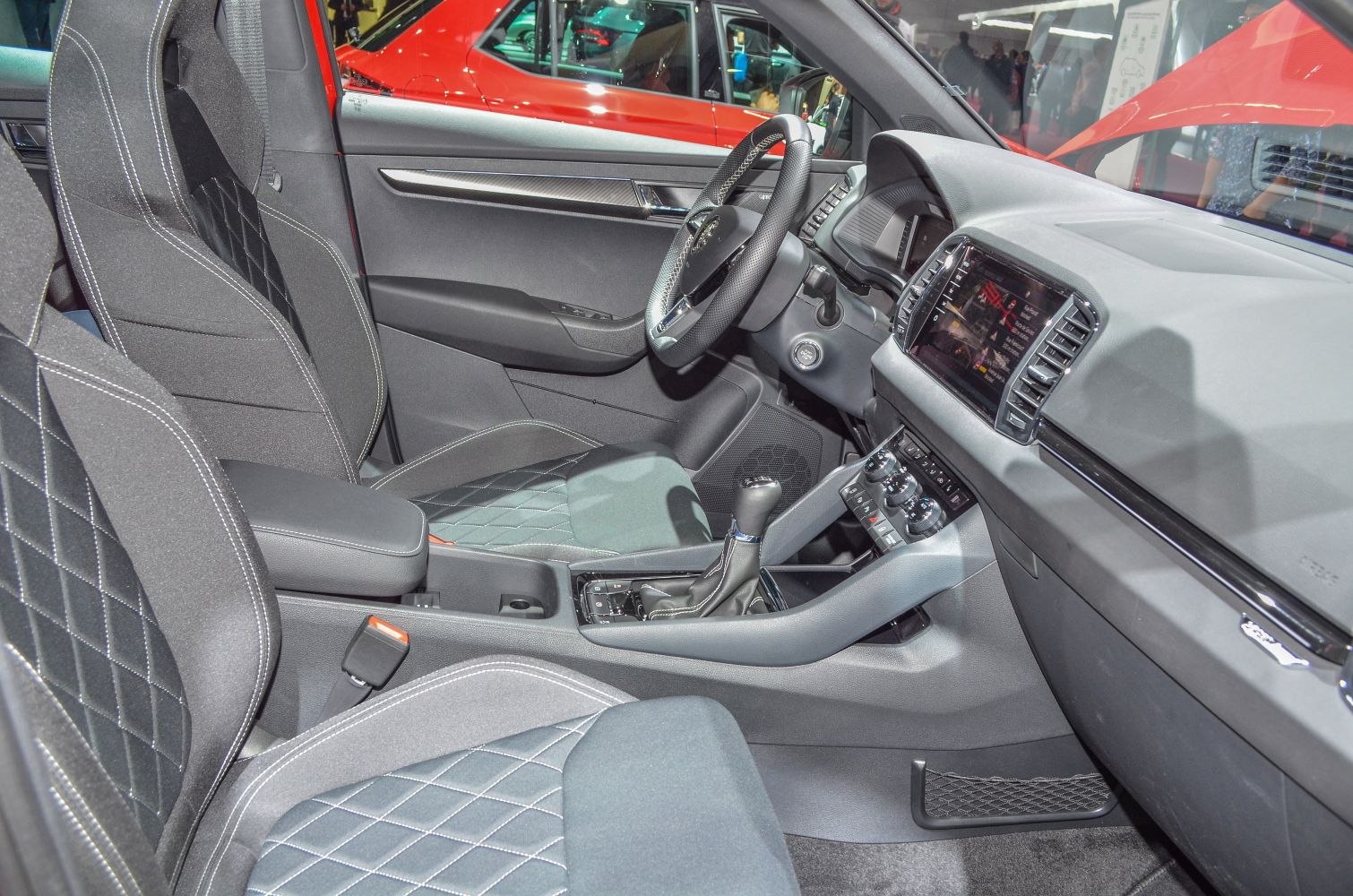 Diamond-stitched front seats and advanced dashboard with touchscreen