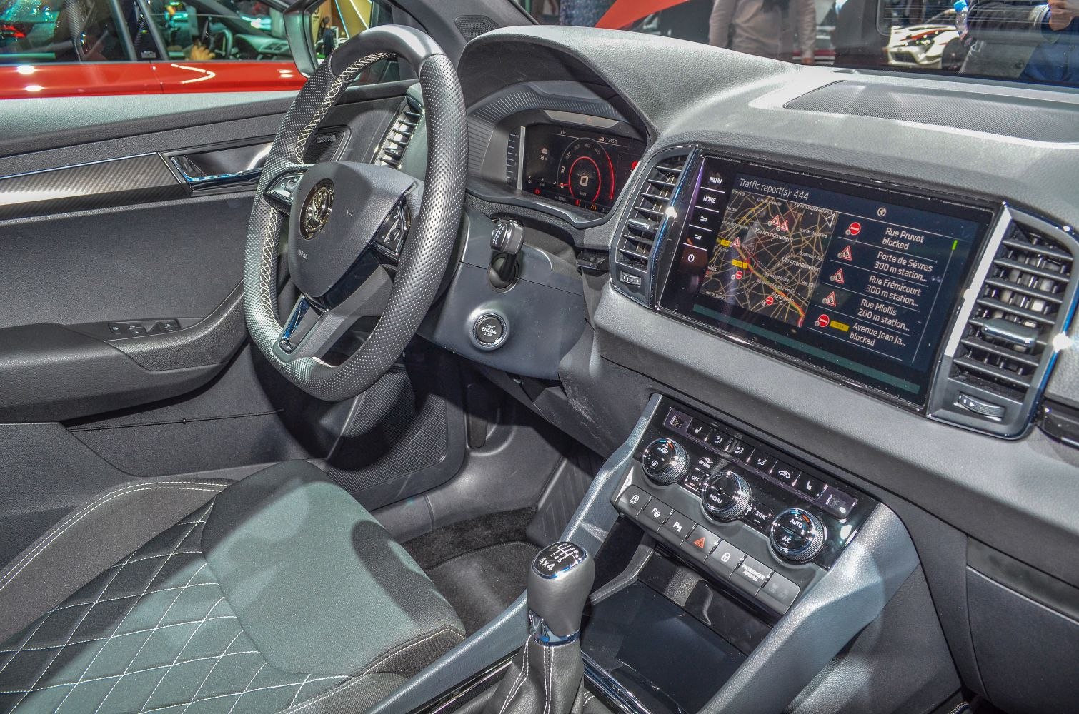 Digital instrument cluster and touchscreen navigation in car interior