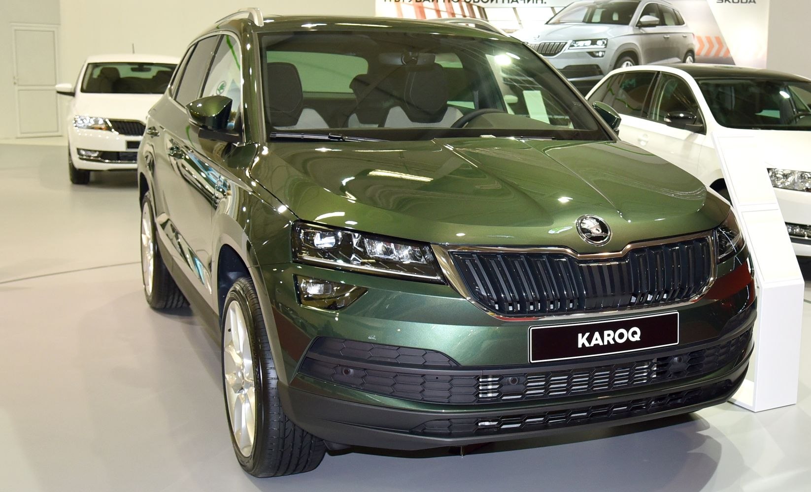 Aggressive LED headlights and bold black grille on modern SUV front
