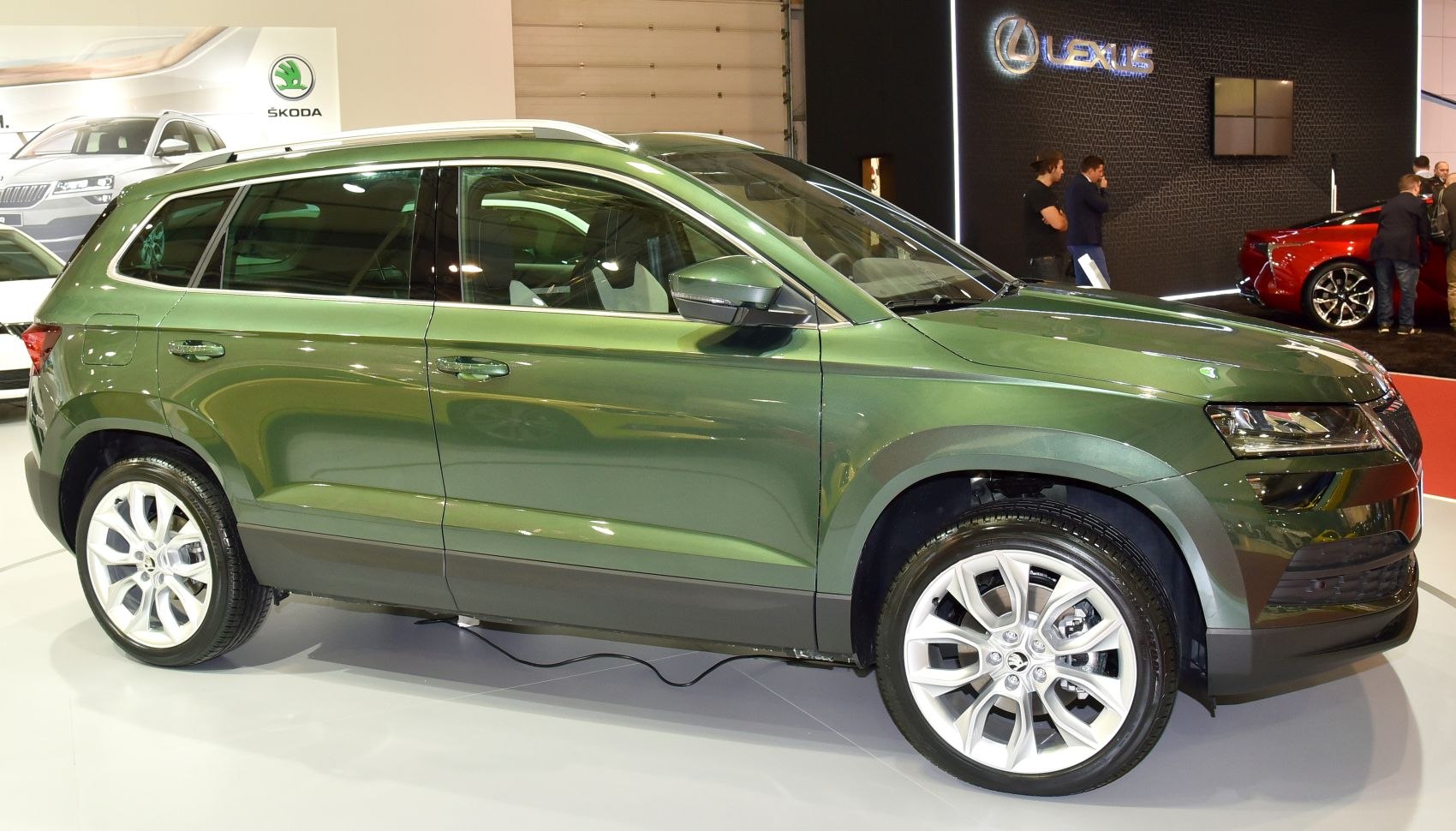 Side profile of SUV with alloy wheels and roof rails