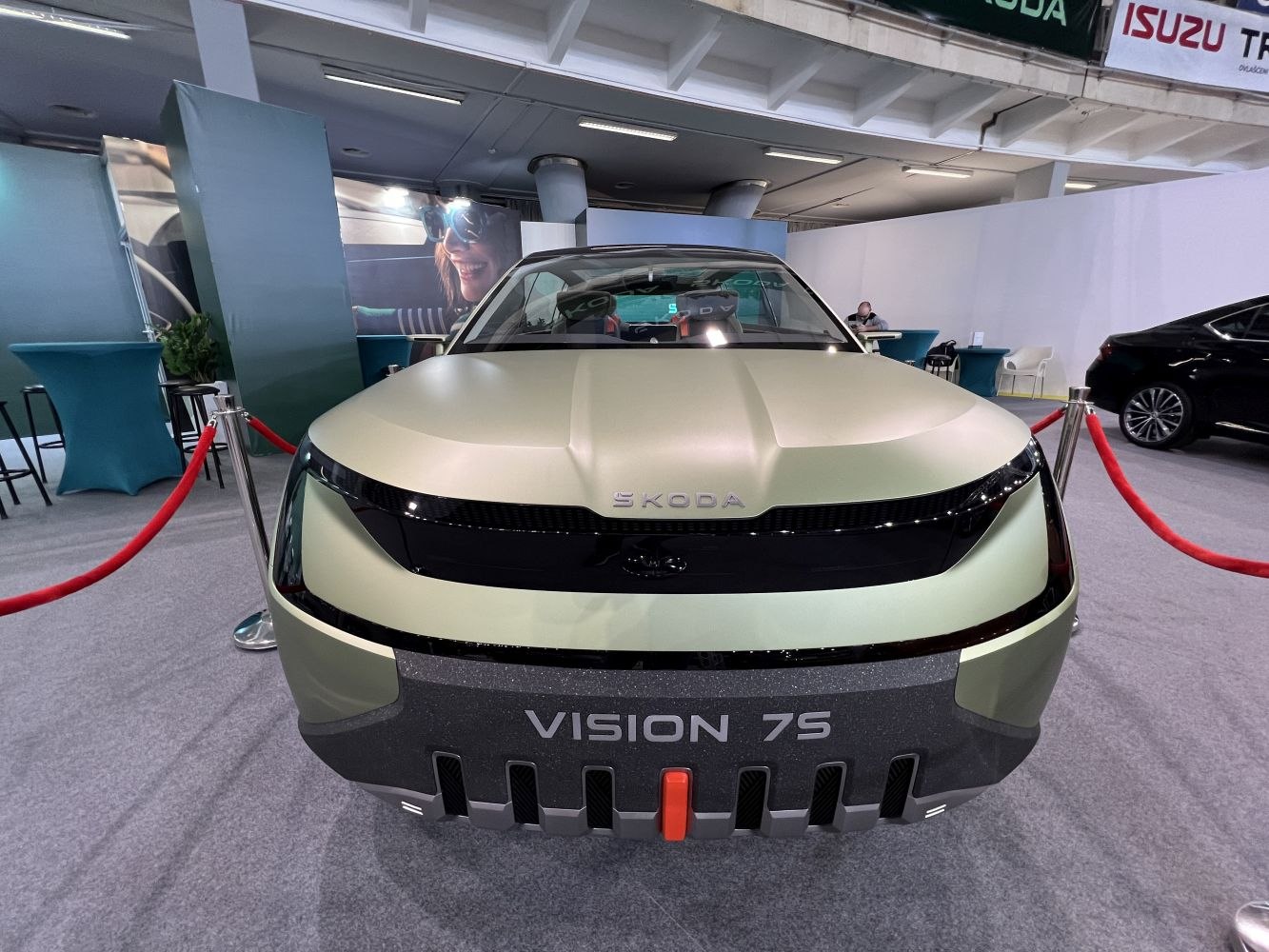 Futuristic front design with sleek headlights and bold grille