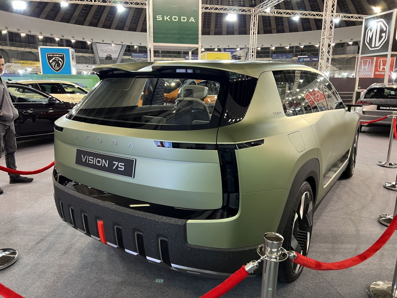 Futuristic SUV rear design with matte green finish and distinctive taillights