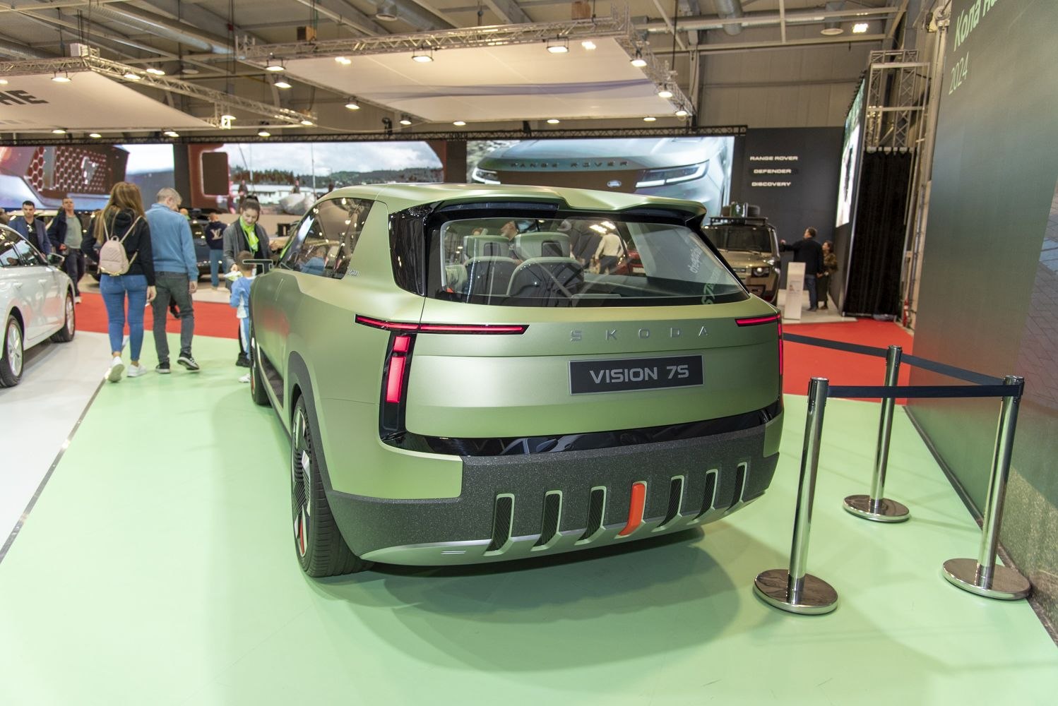 Futuristic electric SUV rear with sleek tail lights and bold bumper