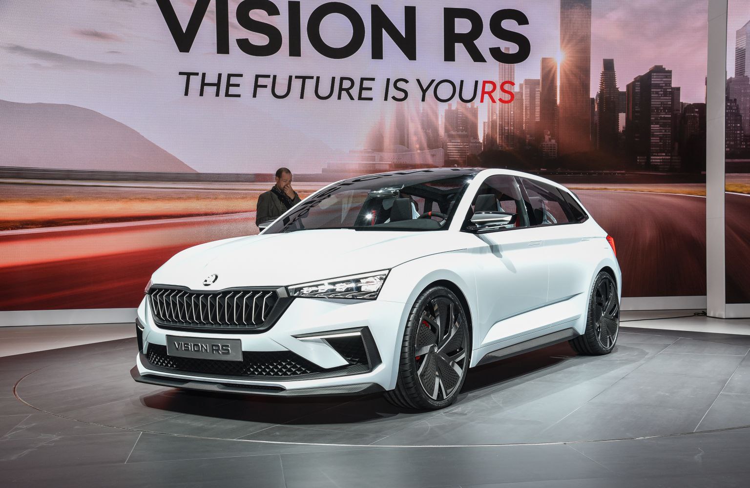 Futuristic front grille and sleek LED headlights of a concept hatchback